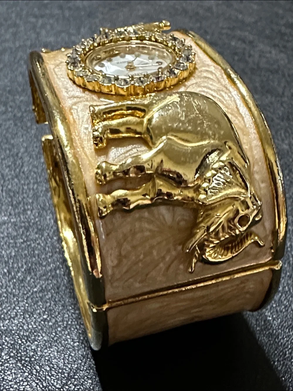 Cannes Gold Tone Elephant Hinged Enamel Clamper Bracelet Watch